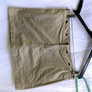 Dockers, size 12 skort, excellent condition. Tan. 2 pockets , front. 1 in back.